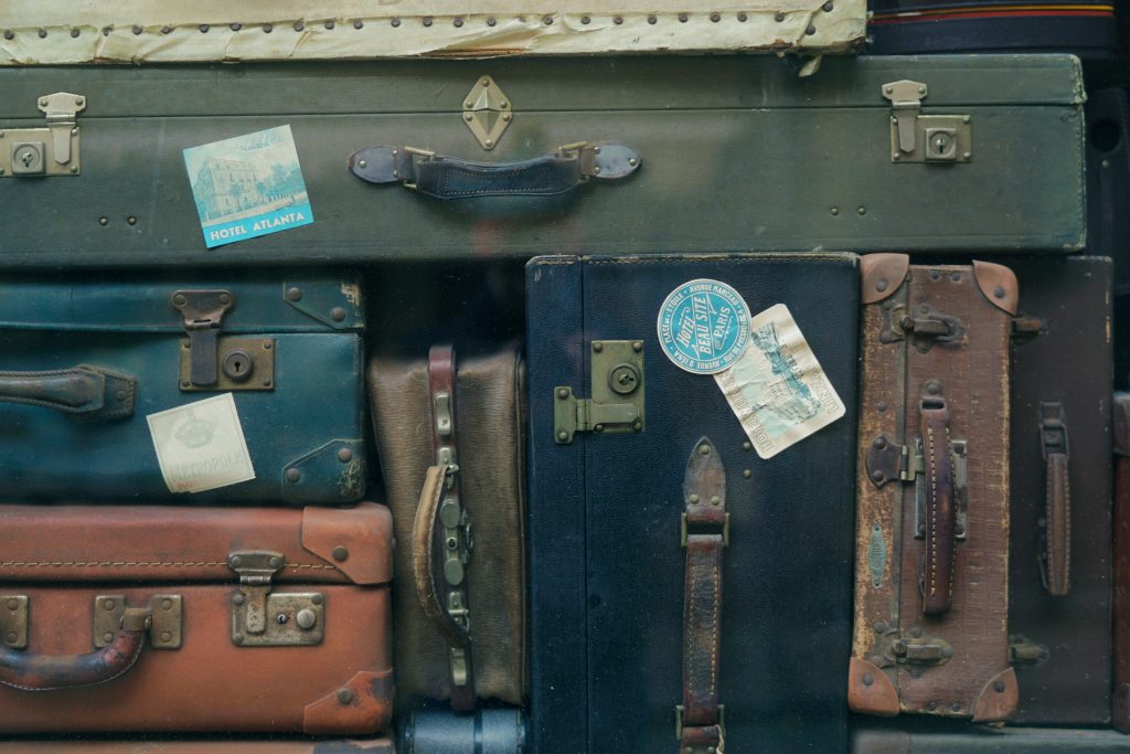 Canva-Stack-of-Old-Suitcases-1024x683